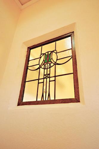 a stained glass window in a room at Nasu Kogen KIRIN House Suite villa - Vacation STAY 83276 in Nasu-yumoto