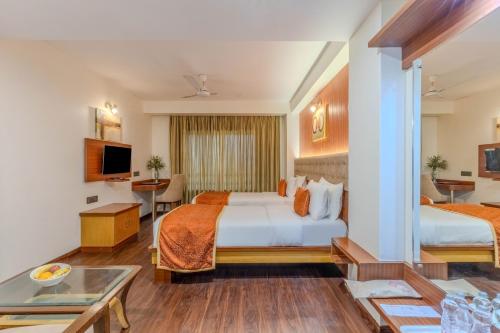 Katil atau katil-katil dalam bilik di Hotel President