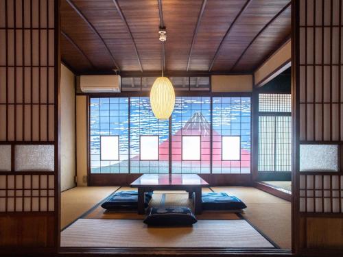 a room with a table in front of a window at Tabino Shiori - Vacation STAY 83814 in Takayama