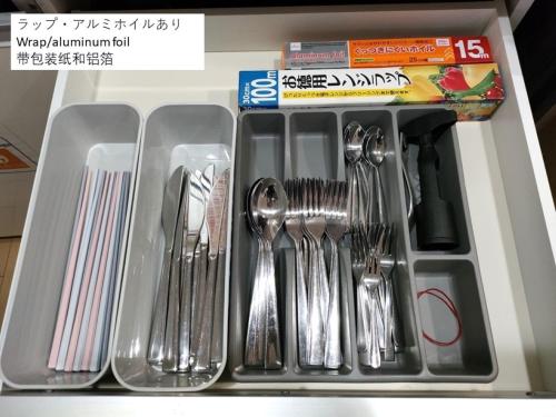 a plastic tray with utensils in a drawer at Kumamoto - House - Vacation STAY 83489 in Kumamoto