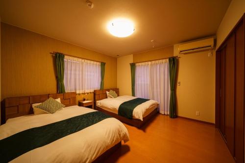 Katil atau katil-katil dalam bilik di Yuki-an Bettei - Vacation STAY 86836