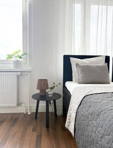 Postel nebo postele na pokoji v ubytování Videsten Old Town Studio