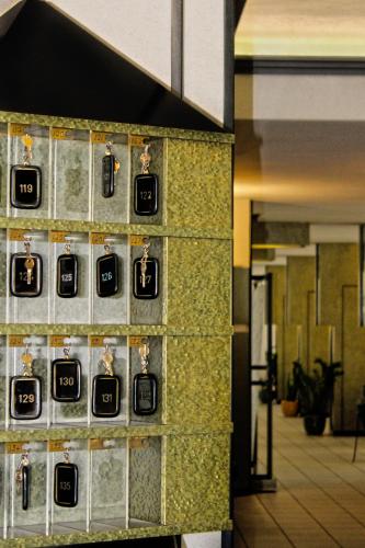 a wall with lockets on the side of a building at Park Hotel in Castrocaro Terme
