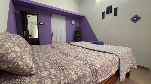 Ein Bett oder Betten in einem Zimmer der Unterkunft Hide out villa