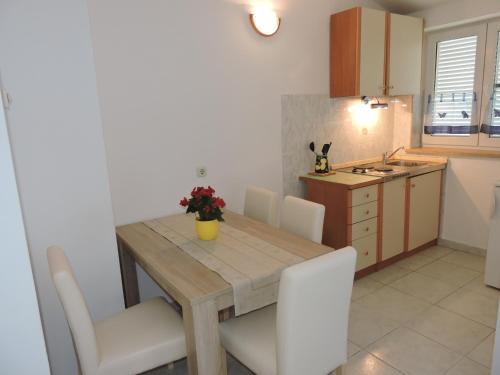 Kuchyň nebo kuchyňský kout v ubytování Apartments Vera