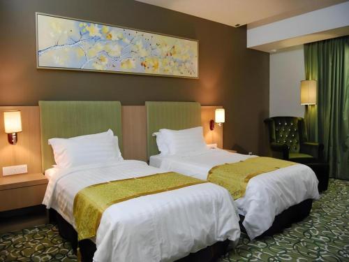 Ένα ή περισσότερα κρεβάτια σε δωμάτιο στο Hotel AIFA