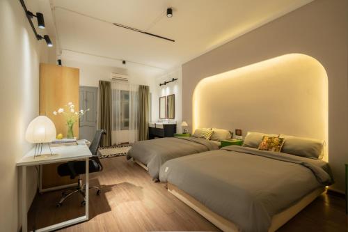 Postel nebo postele na pokoji v ubytování La paix homestay