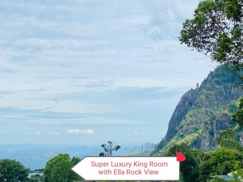 a sign that reads super luxury king room with elle rock view at The Rock Face in Ella