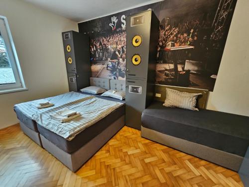 Postel nebo postele na pokoji v ubytování ArtRock Residence