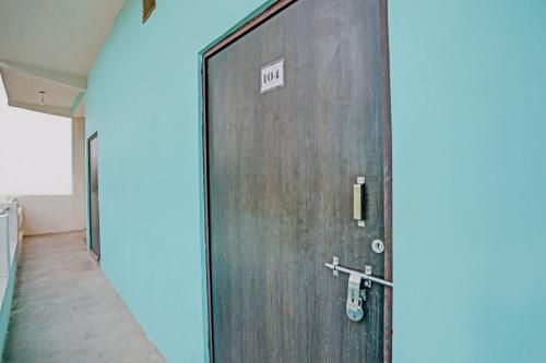 a door with a no entry sign on it at Hotel O New Jagrani palace in Kānpur