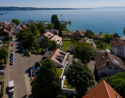 an aerial view of a town by the water at Gästehaus Holzer in Konstanz