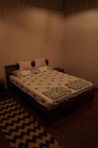 Katil atau katil-katil dalam bilik di Kosha Farm Stay