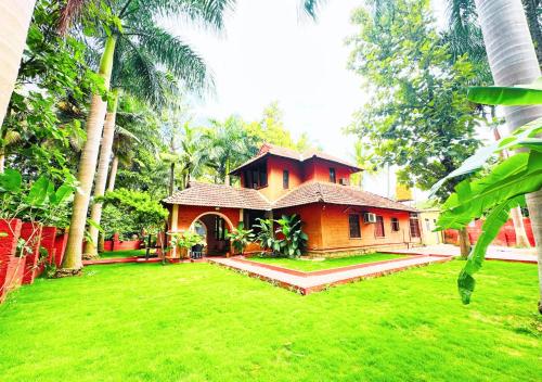 Ambara Kovilakam Private Pool Villa By Travent Mugにある庭