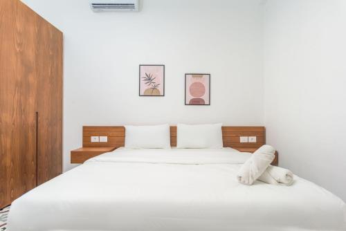 Ένα ή περισσότερα κρεβάτια σε δωμάτιο στο Stairway - Cozy Studios In Mar Mikhael