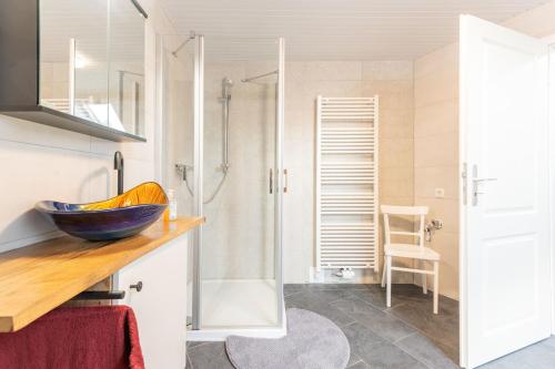 Ένα μπάνιο στο Ferienwohnung Eulennest, 35230