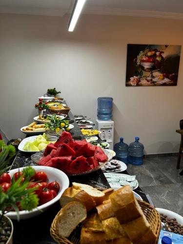 a table with many plates of food on it at New Fors Hotel in Istanbul