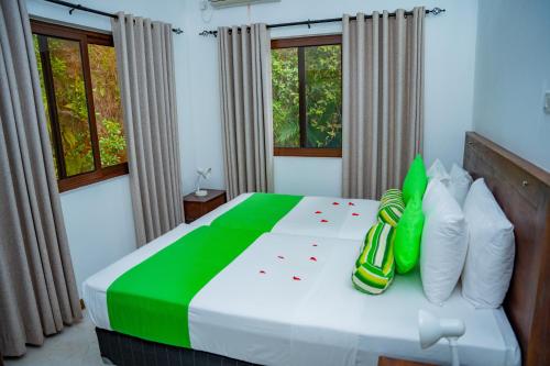 Katil atau katil-katil dalam bilik di Kanasuk Self catering Apartments