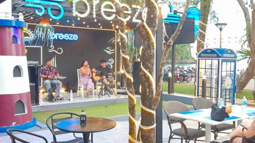 a group of people on a stage at a concert at Holiday Style Ao Nang Beach Resort, Krabi in Ao Nang Beach