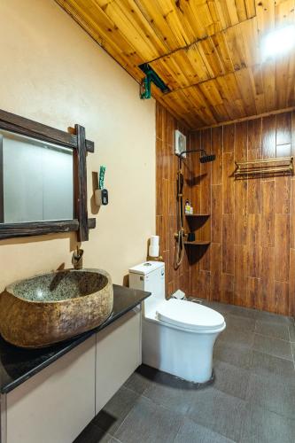 a bathroom with a sink and a toilet at Love House Homestay SAPA in Sa Pa