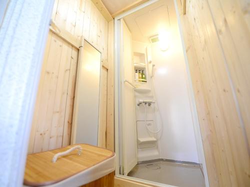 a small bathroom with a shower and a sink at Kochi - House - Vacation STAY 88439 in Kochi