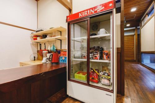 a kitchen with at Couch Potato Hostel - Vacation STAY 88228 in Matsumoto
