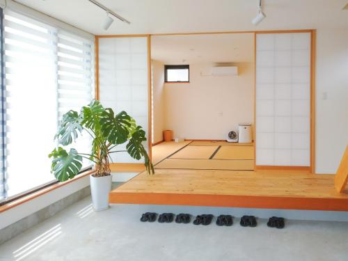 a room with a gym with black balls on the floor at Kino-saji - Vacation STAY 89208 in Ibusuki