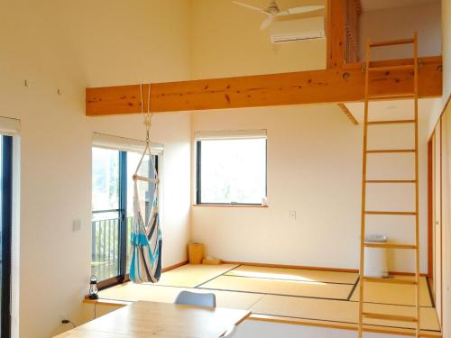 a room with a loft bed in a house at Kino-saji - Vacation STAY 89208 in Ibusuki