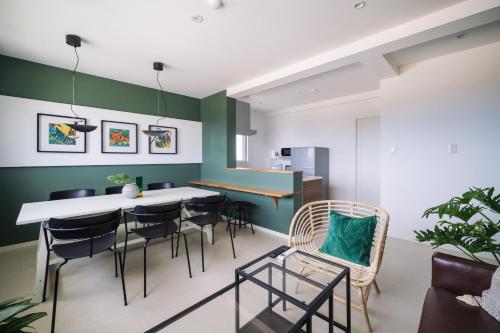 a dining room with a table and chairs at 257-1 - Vacation STAY 91238 in Jima