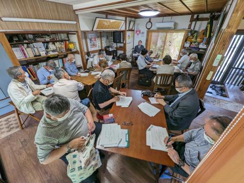 a group of people sitting at a table in a room at guest house Ki-zu - Vacation STAY 92940 in Nishio