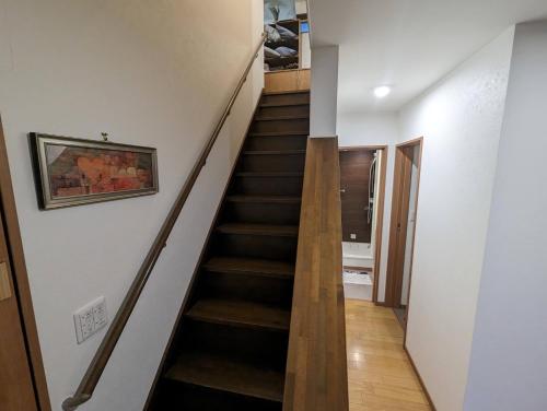 a staircase in a home with a stair case at guest house Ki-zu - Vacation STAY 94978v in Nishio