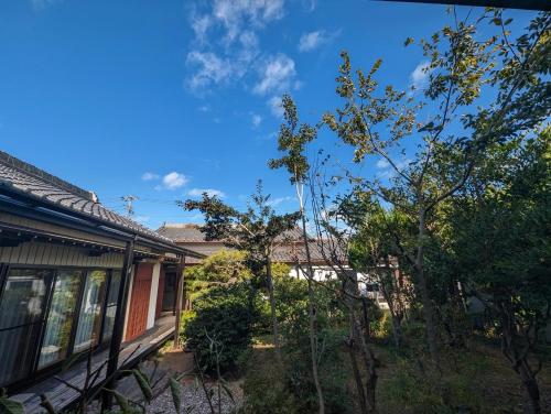 a house with trees in front of it at guest house Ki-zu - Vacation STAY 94978v in Nishio