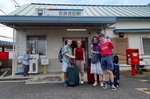 a group of people standing in front of a gas station at guest house Ki-zu - Vacation STAY 94978v in Nishio