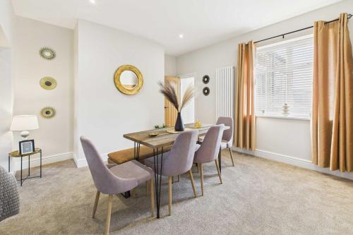 a dining room with a table and chairs at Host & Stay - Jomor House in Burnhope