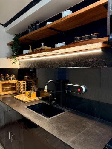 a kitchen with a sink and a counter top at Entire Home in Pampanga in San Fernando