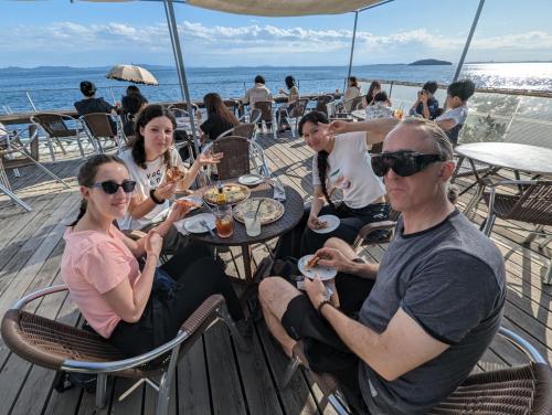 a group of people sitting at a table on a cruise ship at guest house Ki-zu - Vacation STAY 95389v in Nishio
