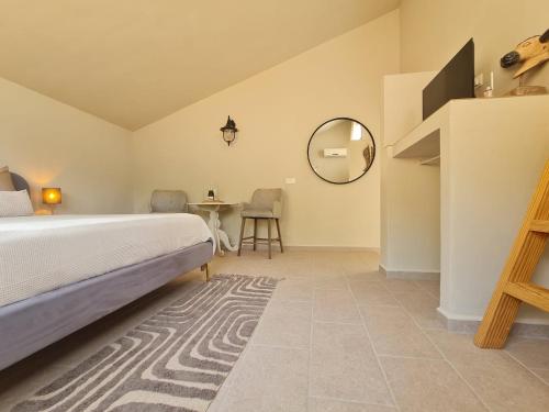Ένα ή περισσότερα κρεβάτια σε δωμάτιο στο Casa La Jolla B&B