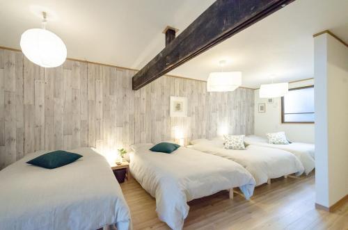 Ένα ή περισσότερα κρεβάτια σε δωμάτιο στο Hakodateyado Mizuki - Vacation STAY 97486