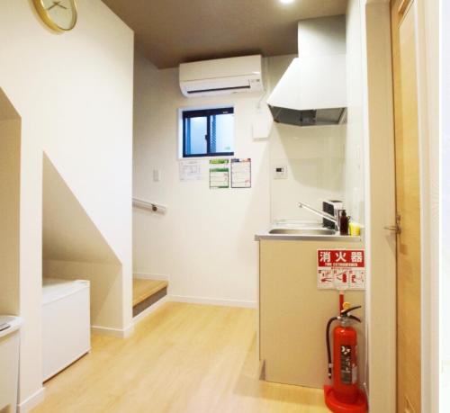 Kuchyň nebo kuchyňský kout v ubytování KYOSTAY Iroha Soragi 1 - Vacation STAY 03847v