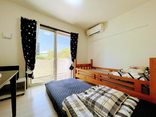 Giường trong phòng chung tại Credo Maison Kamakura - Vacation STAY 10345