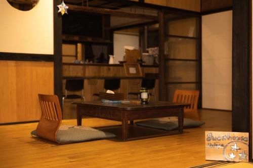a living room with a table and a coffee table at Onjuku ikkyu - Vacation STAY 14021v in Hongu