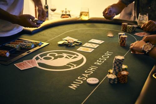 a group of people playing poker on a poker table at 634 Condo Yotsuya - Vacation STAY 14799v in Tokyo