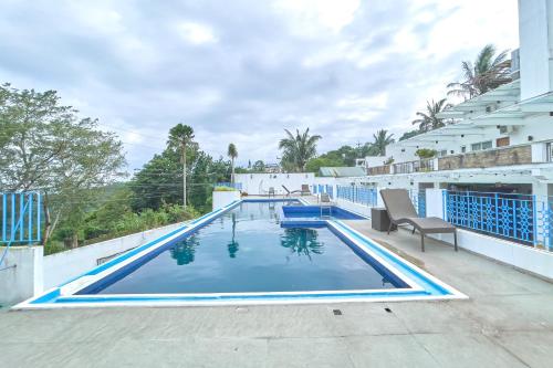 a swimming pool on the roof of a building at Tagaytay Hotel SixB in Tagaytay