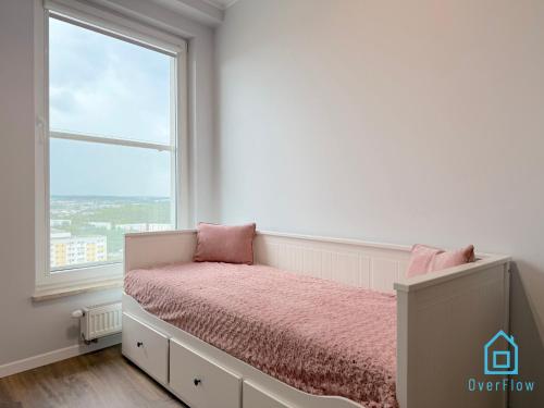 Katil atau katil-katil dalam bilik di Elite Apartment 15 min to Old Town Gdansk