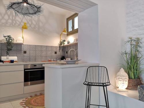 Η κουζίνα ή μικρή κουζίνα στο Pied-à-Terre Naousa, Paros