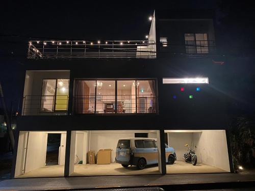 a building with a car parked in front of it at DaigeBlue - Vacation STAY 20513v in Meta