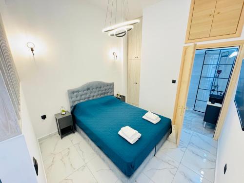 Postel nebo postele na pokoji v ubytování Egkremou apartment