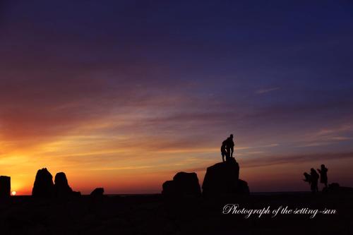 a silhouette of a person riding a horse at sunset at STEP by STEP - Vacation STAY 25757v in Kanayama