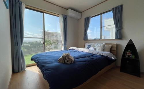 Postel nebo postele na pokoji v ubytování Hyakuna Beach Resort - Vacation STAY 19762v