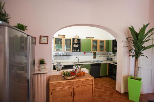 A kitchen or kitchenette at Villa Edda Heated Pool