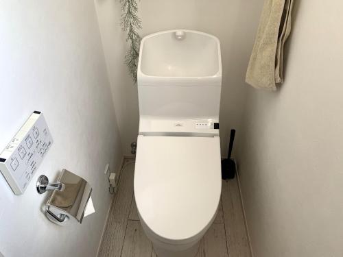 a bathroom with a white toilet in a room at Nasushiobara Renga no ie SORA - Vacation STAY 10890 in Nasushiobara